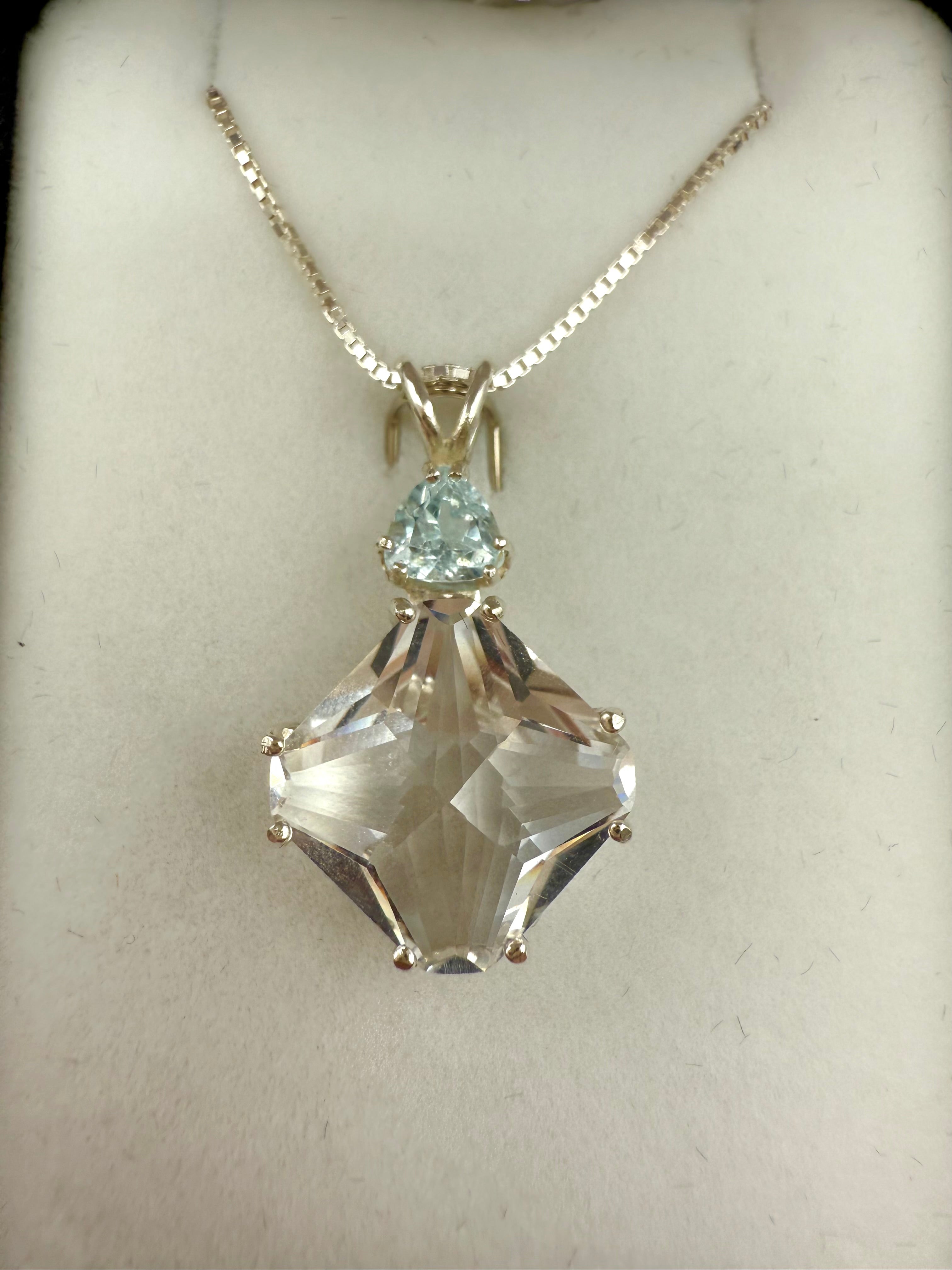 Clear Quartz Small Magician Stone with Trillion Cut Blue Topaz