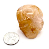 Golden Healer Quartz Skull Palmstone
