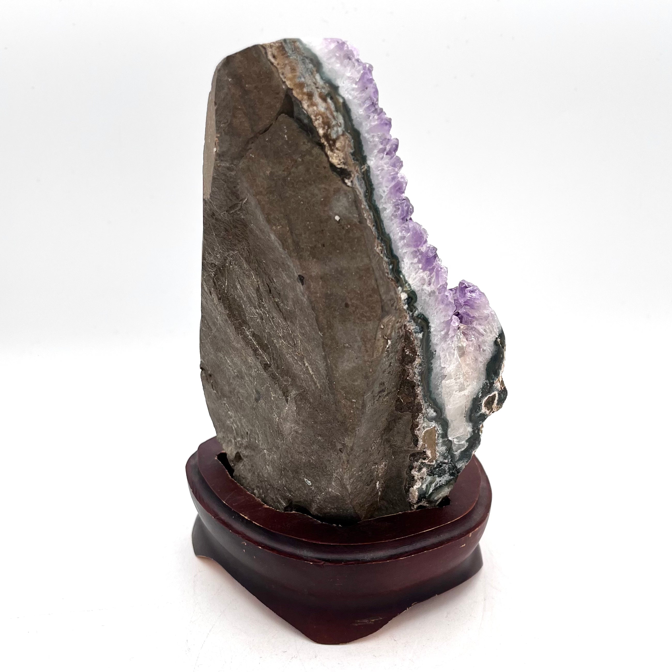 Raw and Polished Amethyst Cluster in Wooden Stand